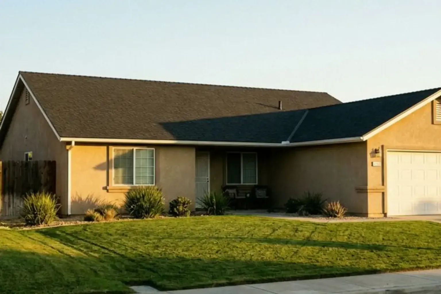 Roofing crew working on a residential roof in Provo, Utah