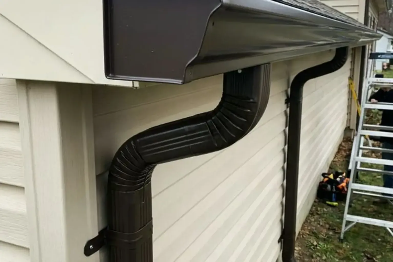 Gutter repair and cleaning on a residential home in Provo, Utah